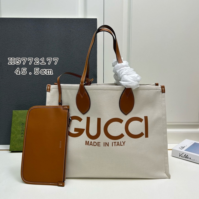 G*u*i shopping bags